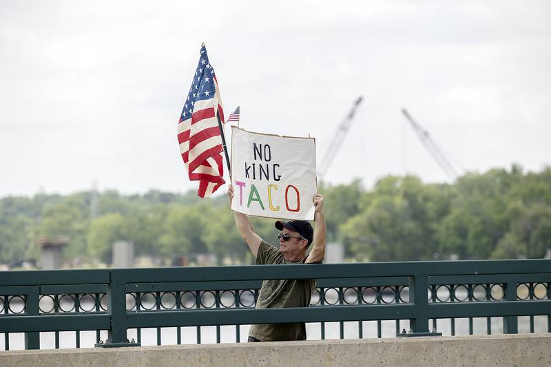 Protesters in Dixon join a nationwide No Kings protest Saturday, June 14, 2025. The anti-Trump gathering lined both sides of the Peoria Avenue Bridge.