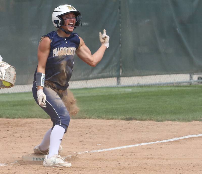 Marquette's Lindsey Kaufmann reacts while reaching third base during the Class 1A Supersectional game on Monday, May 29, 2023 at Illinois Wesleyan University in Bloomington.