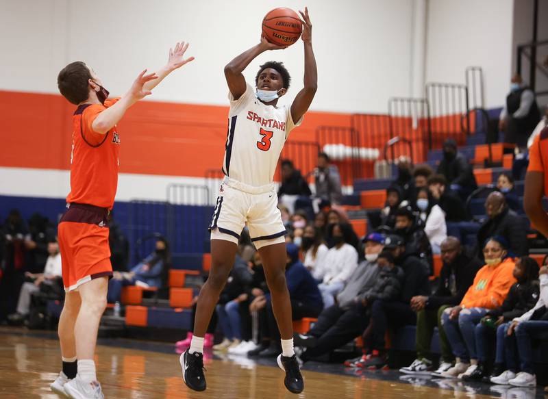 Romeoville's Meyoh Swansey launches a deep shot against Brother Rice. Saturday, Jan. 15, 2022 in Romeoville.