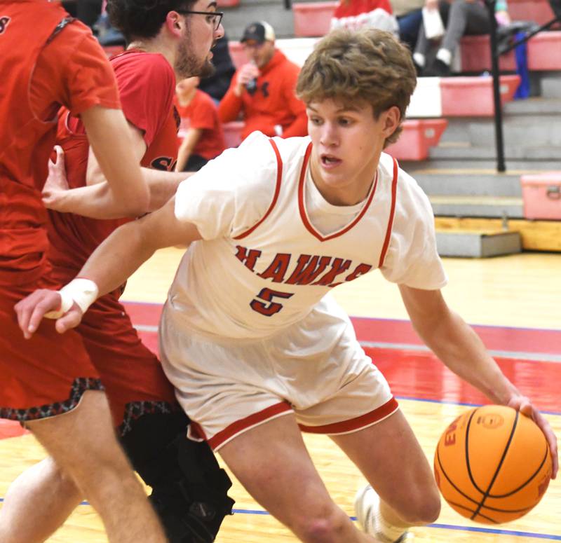 Oregon's Tucker O'Brien (5) drives the baseline against South Beloit on Monday, Nov. 24, 2025 during the Oregon Boys Basketball Thanksgiving Tournament in Oregon.