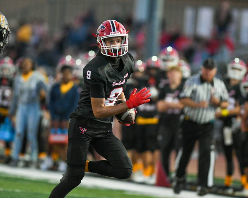 Yorkville's AJ DiVito (9) runs the ball during the game on Friday Sept. 5, 2025, while taking on Joliet West held at Yorkville High School.