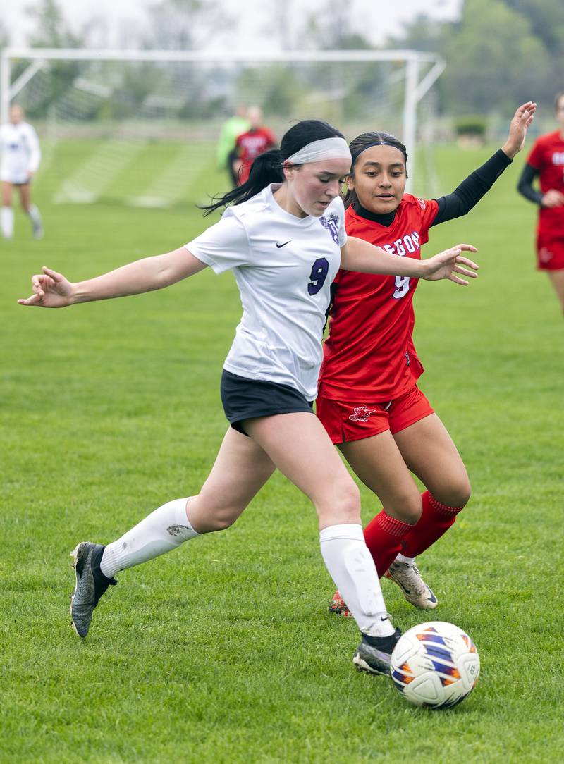 Dixon’s Ava Littlejohn works against Oregon’s Bezzali Cadenas Thursday, May 1, 2025.