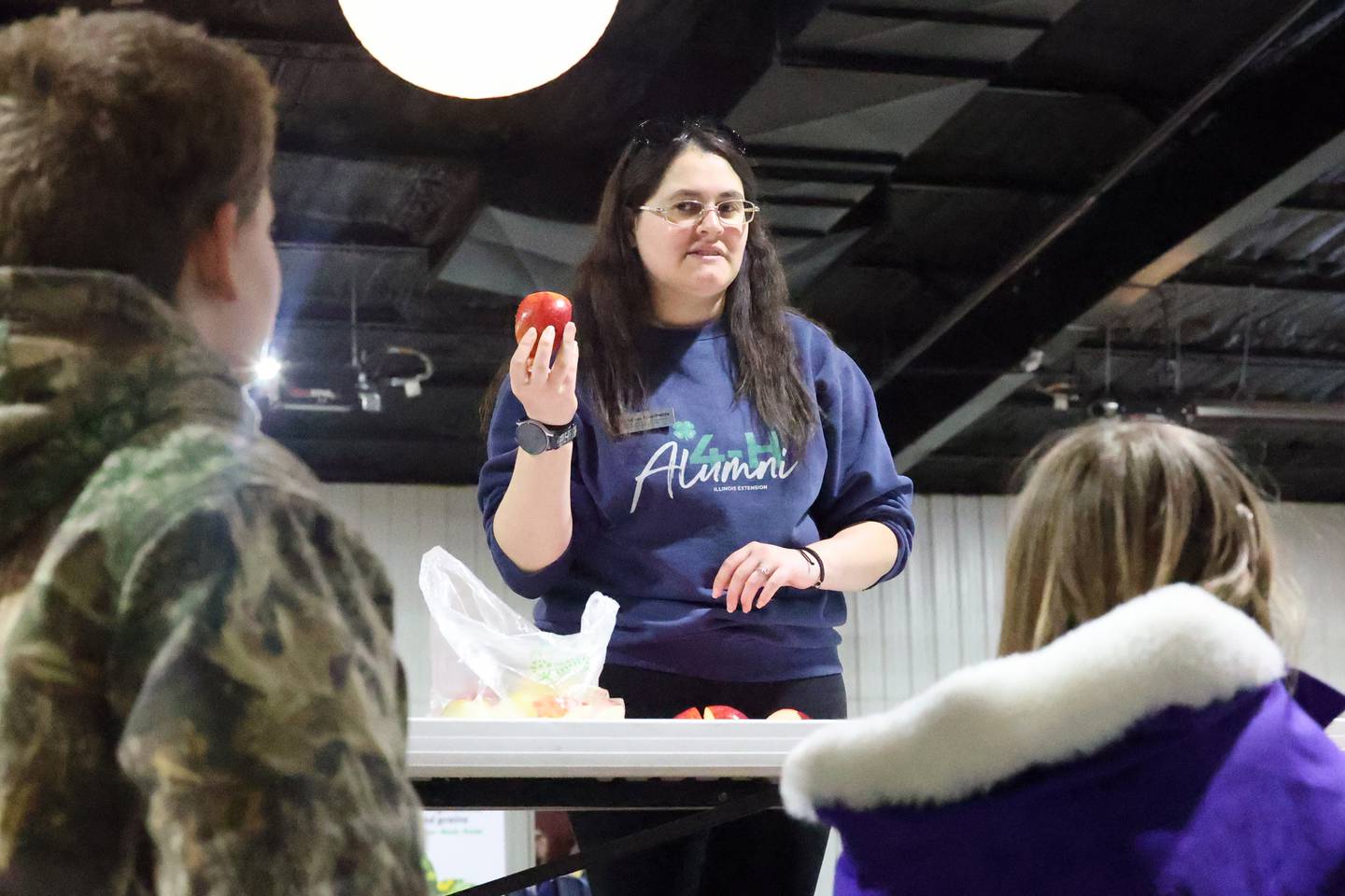 Brittney Muschetto, of the University of Illinois Extension, gives a presentation to fourth-graders during the Kankakee County Farm Bureau's 22nd Kids Day at the Farm held Thursday, March 20, at the Kankakee County Fairgrounds.