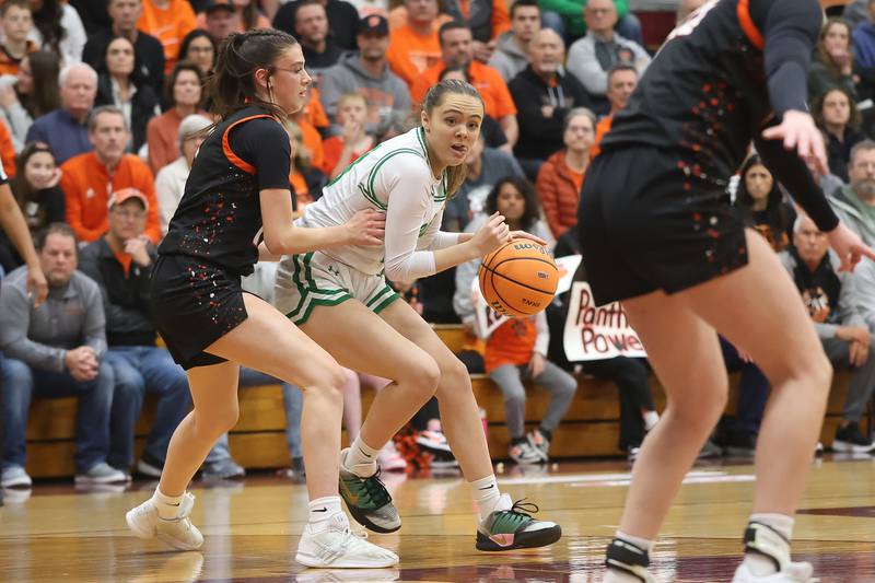 Providence’s Liv Anderson works the ball against Washington in the Class 3A Kankakee Super-Sectional game on Monday, March 3, 2026 in Kankakee.