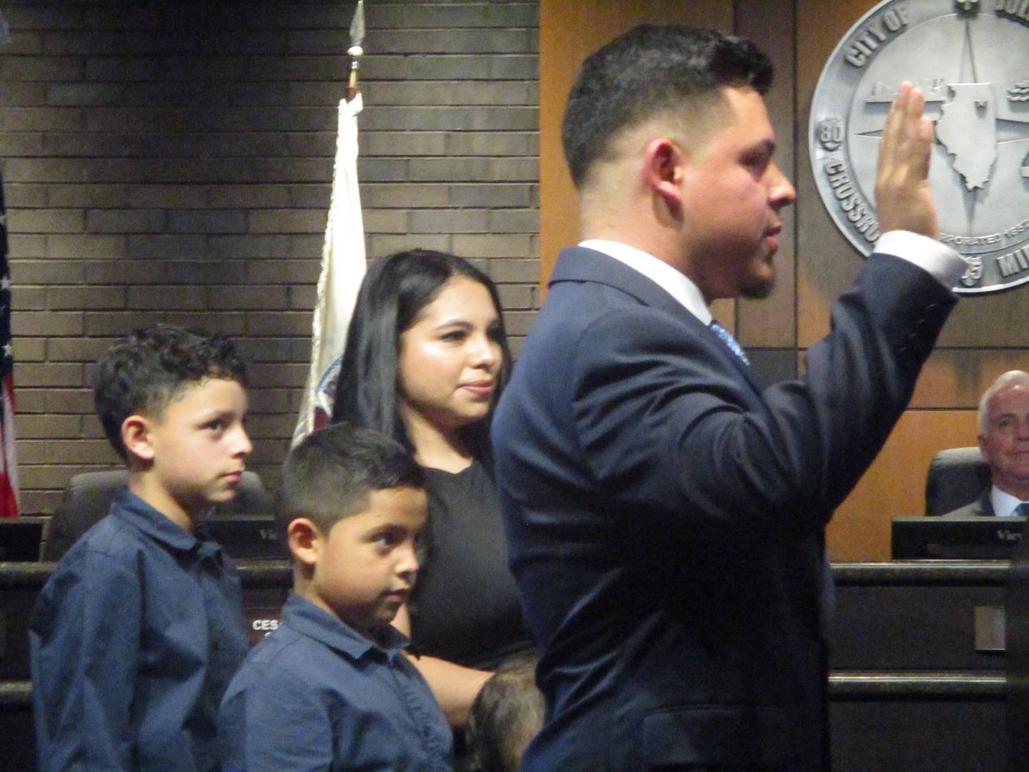 New Joliet Councilman Juan Moreno takes the oath of office on Monday with his family beside him. May 5, 2025