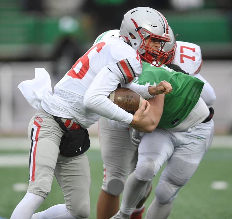 Palatine’s Tommy Elter tries to run against York in a Class 8A quarterfinal playoff football game in Elmhurst on Saturday, November 12, 2022.