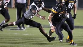 Photos: DeKalb football travels to Aurora for a matchup with Metea Valley