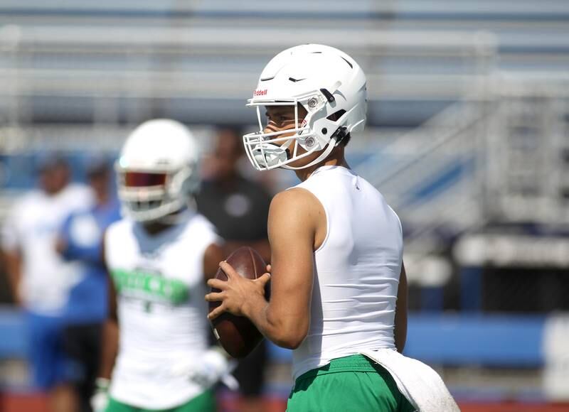 York quarterback Matt Vezza looks to pass the ball during a 7 on 7 tournament at St. Charles North High School on Thursday, June 30, 2022.