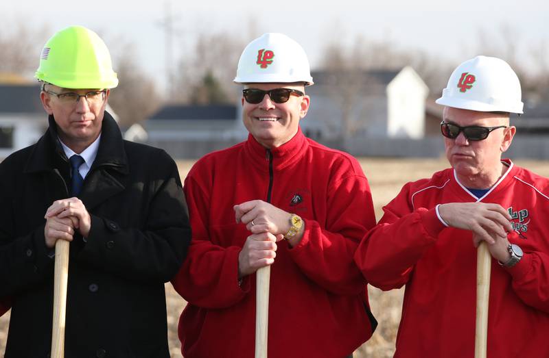 (From left) La Salle-Peru Township High School board member Matt Merboth, superintendent Steve Wroblewski, and board member Tony Sparks speak during a ground breaking ceremony on a 9.5 million dollar addition to the La Salle-Peru Township High School Athletic Complex on Tuesday, March 7, 2023 in La Salle. This project will see the addition of competition baseball and softball diamonds, expansion of tennis courts, and installation of artificial turf to the school’s soccer field, along with expanded parking space. Additionally, restroom facilities will be added to the existing soccer field utility building and a structure will be built near the baseball/softball diamonds to serve as a concession stand, press box, and restrooms.