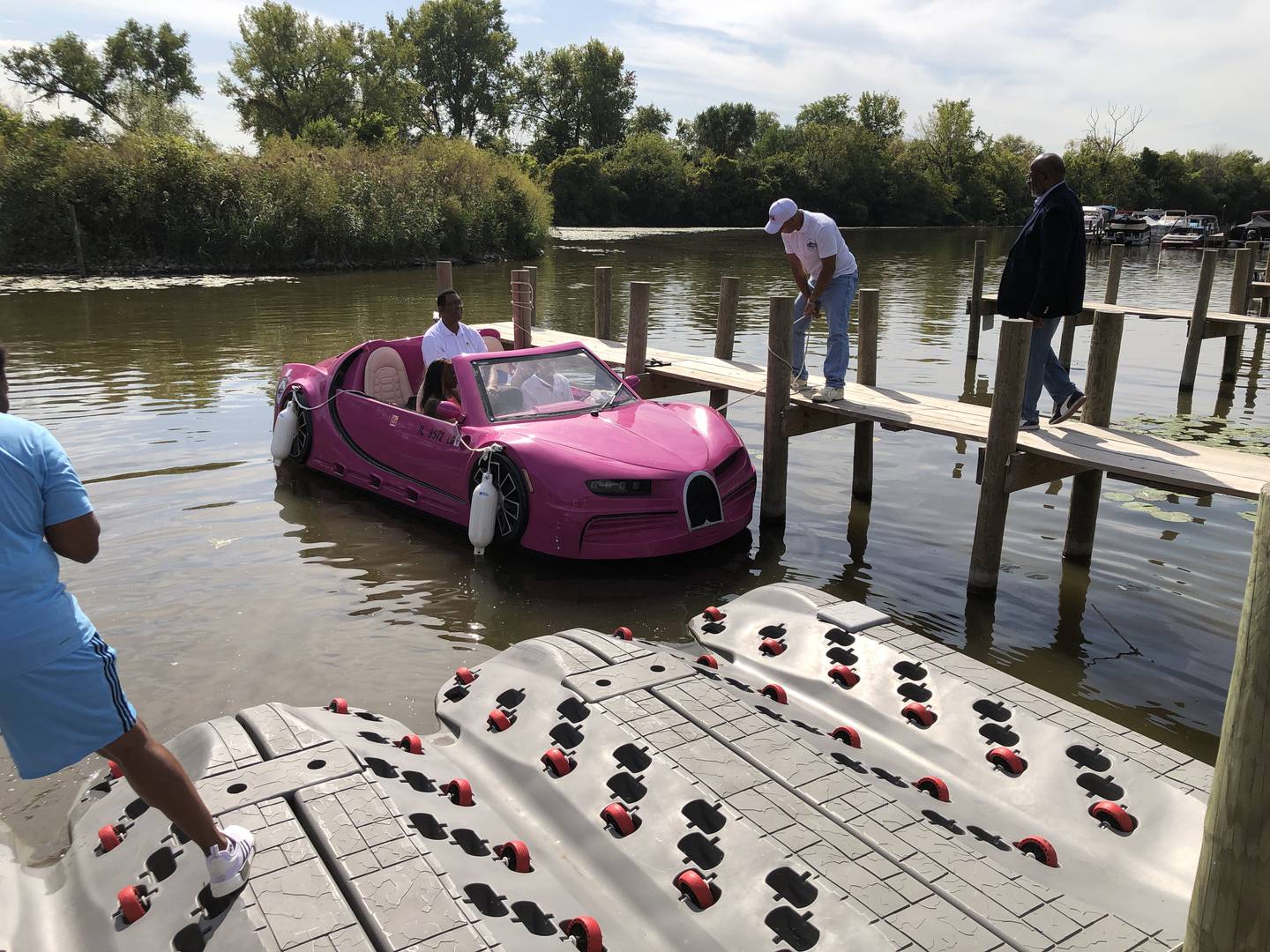The Barbie World car is one of at least five water boat cars Chicago-based Luxury Jet Cars LLC put in at Port of Blarney on Thursday, Oct. 2, 2025. The company plans to lease the boats - made to look like luxury brand autos - into October and then next year on the Chain O' Lakes. Former Chicago Bulls player and coach, Bill Cartwright, came along for its first launch.