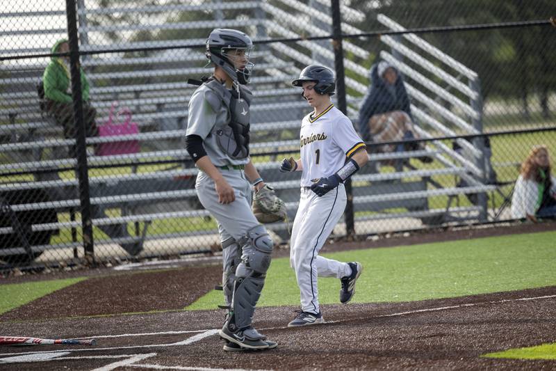 Sterling’s Cale Nettleton comes in to score on a single by Danny Martinez against Geneseo Wednesday, May 6, 2026.