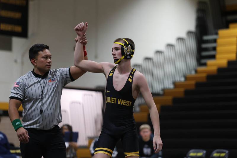 Joliet West’s Jacob Crandall defeats Plainfield South’s Jose Rivas Jr in the 126 pound match on Wednesday, Dec. 3, 2025 in Joliet.