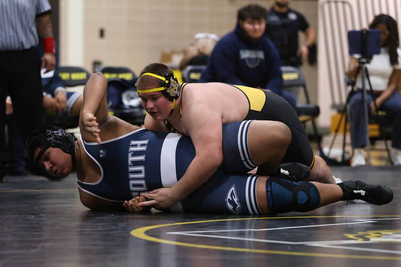 Joliet West’s Andrew Kiobnak brings down Plainfield South’s Gabriel Hernandez in the 285 pound match on Wednesday, Dec. 3, 2025 in Joliet.