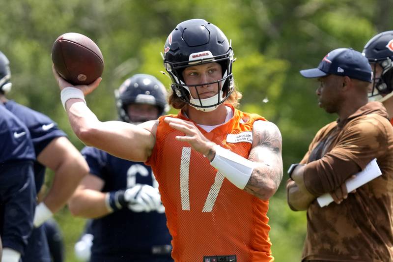 Chicago Bears quarterback Tyson Bagent works on the field with teammates during NFL football practice in Lake Forest, Ill., Friday, May 31, 2024. (AP Photo/Nam Y. Huh)