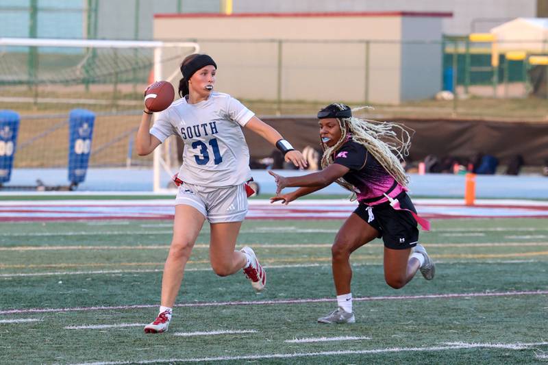 Kankakee's Damariana Tooles tracks down Plainfield South quarterback Brooke McDonald during the Kays' 40-26 victory over Plainfield South on Monday, Oct. 6, 2025.