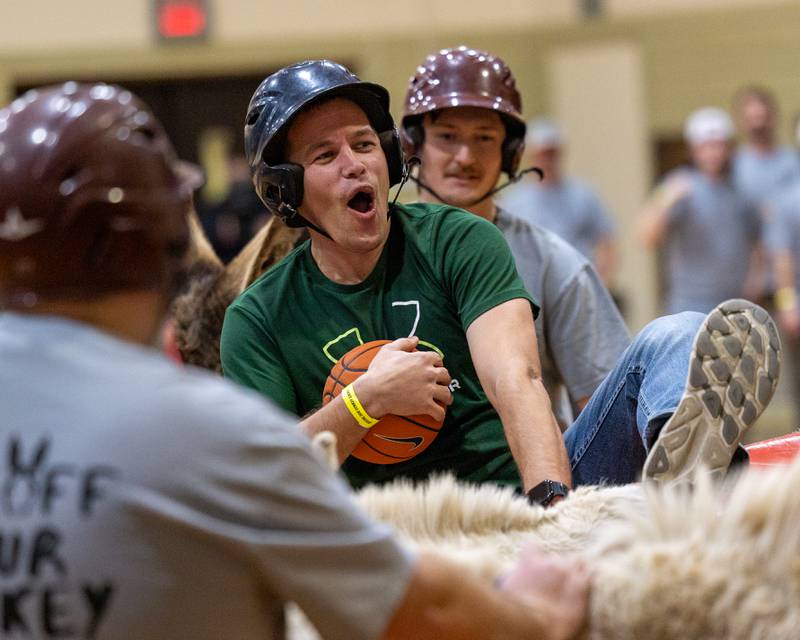 Seneca staff member struggles to stay mounted on Donkey during game of Donkey Basketball on Saturday, Feb. 7, 2026 at Seneca High School West Campus in Seneca.