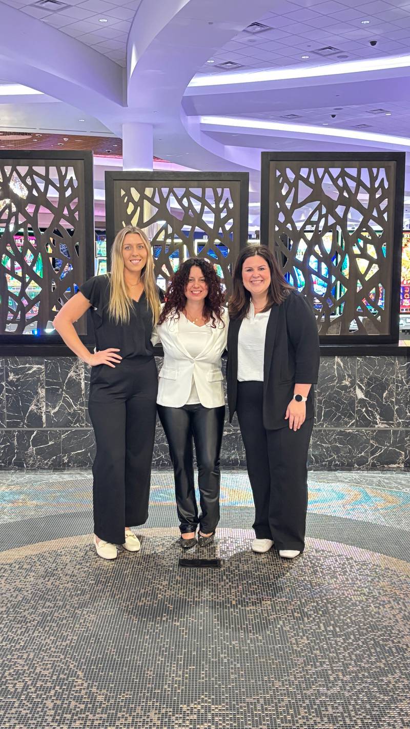 Chamber staff Gigi Corban, Christina Van Yperen and Lena Wickens celebrate at the Illinois Association of Chamber of Commerce Executives conference dinner Nov. 6 after Van Yperen received recognition for her accreditation. Not pictured from the Chamber staff team is Christy Kelly.