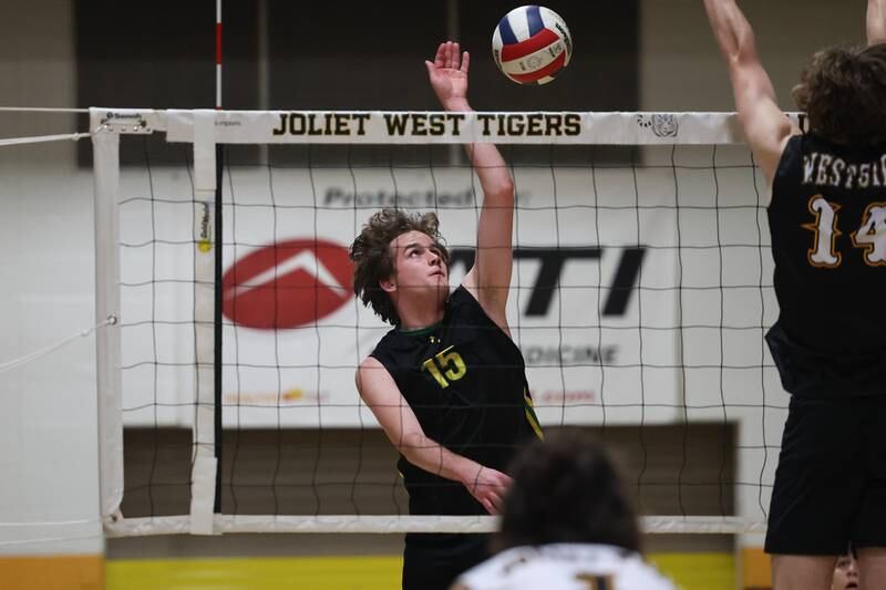 Providence’s Sean Kane goes for the kill against Joliet West on Thursday, March 23, 2023 in Joliet.
