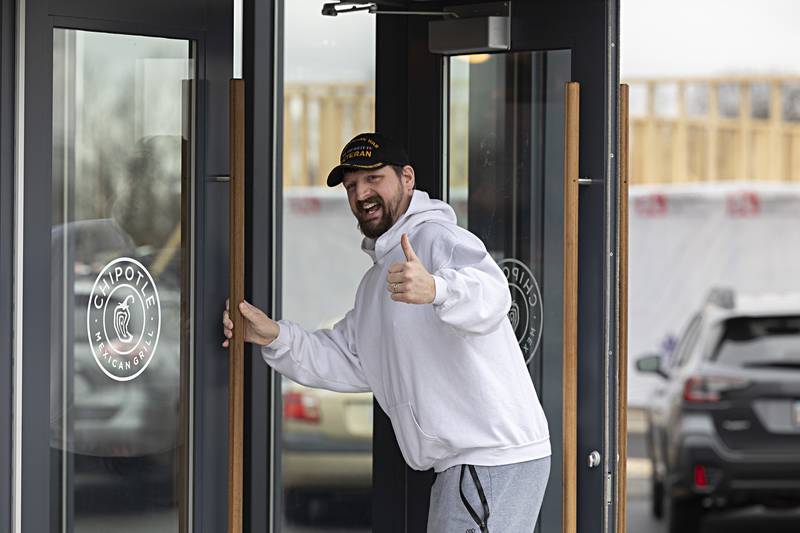 A customer gives a thumbs up as he enters the newly opened Chipotle Friday, Dec. 29, 2023 in Dixon.