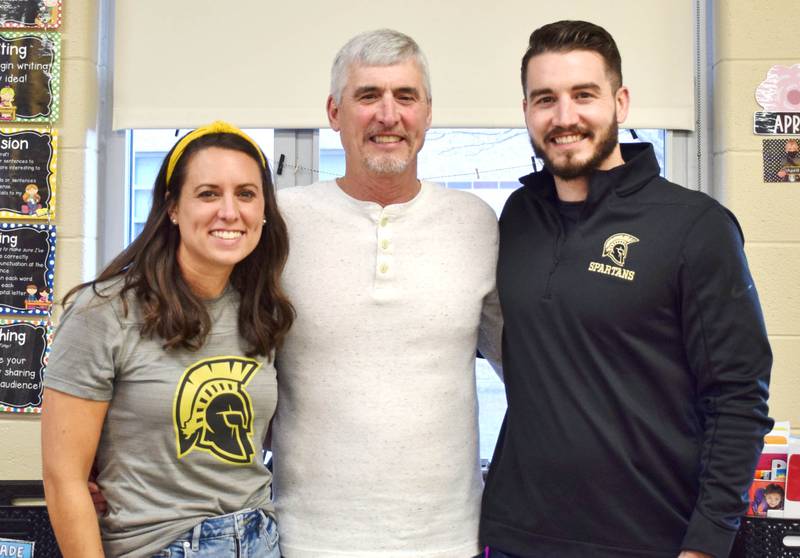 Joe Jordan, 65, retired from Sycamore High School after teaching drivers education and coaching for 29 years. His daughter, Lisa Hoffhines, 36, is a first grade teacher at North Grove Elementary School in Sycamore, and his son, Andy Jordan, 34, teaches social studies at Sycamore High School. From left, Lisa Hoffhines, Joe Jordan and Andy Jordan.