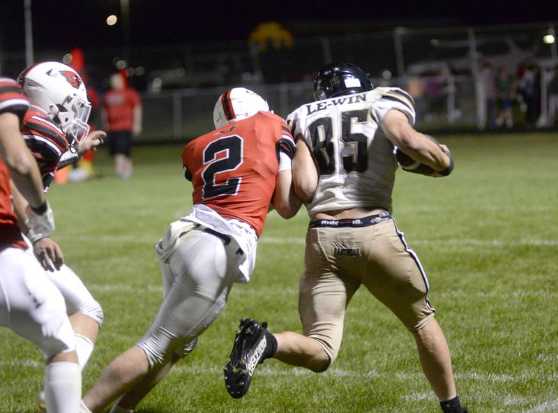 Forreston's Connor Politsch knocks Lena-Winslow's Aiden Wild out of bounds after a big gain on Friday, Aug, 29, 2025 at Forreston High School.