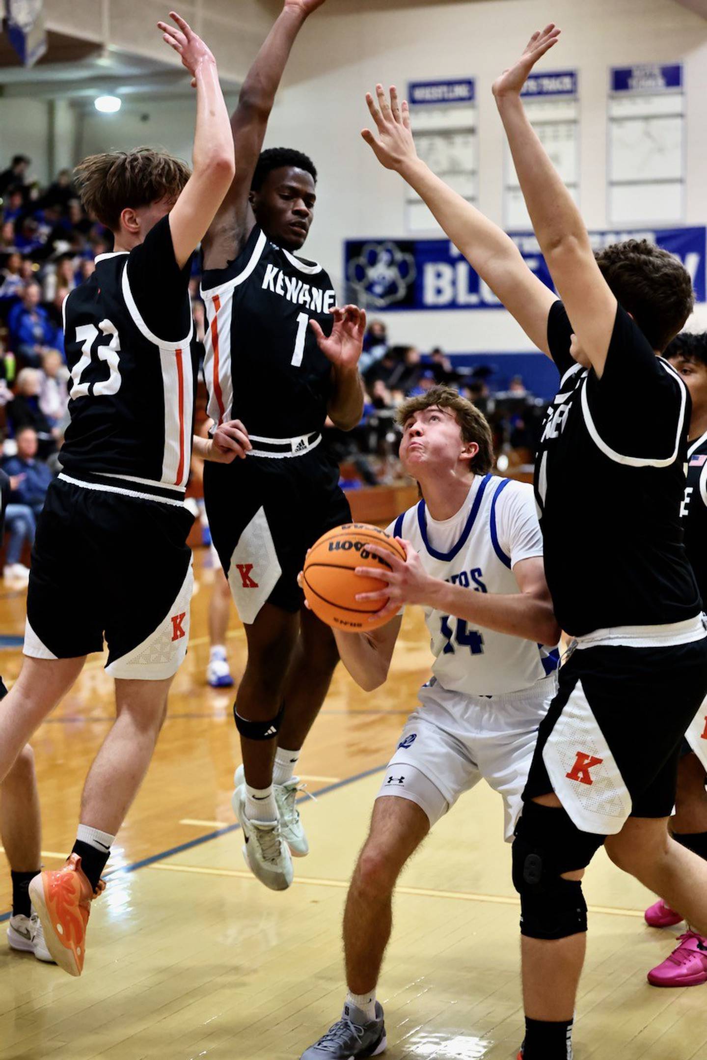 Princeton's Jackson Mason finds himself surrounded by Kewanee Boilermakers Tuesday night at Prouty Gym. The Boilermakers won 75-60.