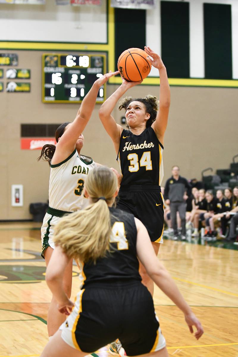 Herscher's Leia Haubner shoots the ball Monday, Feb. 3, 2025, during the Tigers' loss to Coal City at Coal City High School.