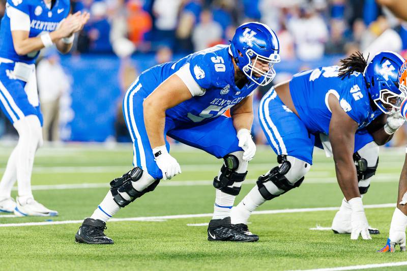 Oswego East graduate Alex Wollschlaeger, shown here during Kentucky's game with Florida, signed with the New Orleans Saints as an undrafted free agent this week.