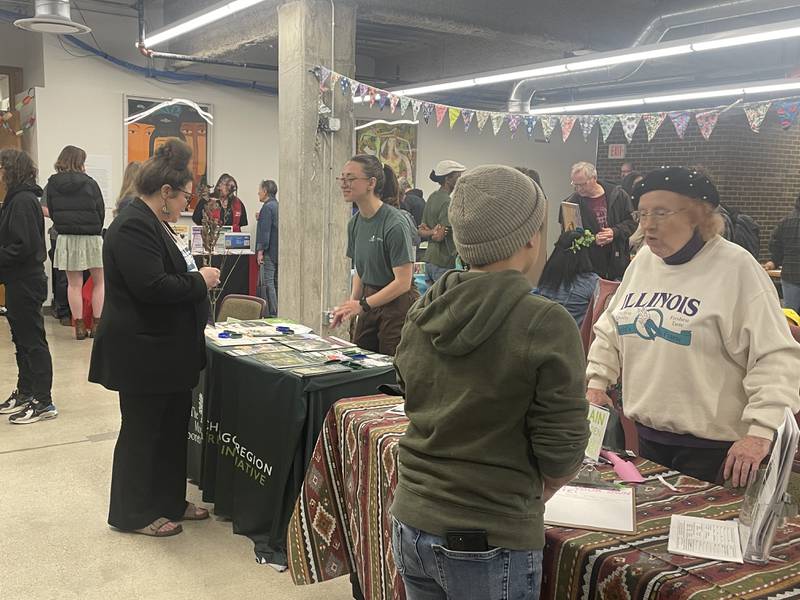 Vendors meet with attendees of the third annual DeKalb County Earth Fest Saturday, April 11, 2026, at NIU's Founders Memorial Library in DeKalb.