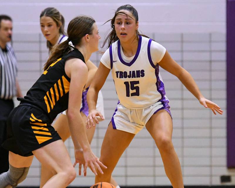 Downers Grove North's Adysen Fanta (15) defends St. Laurence's Sara Burzycki (22) during the 4A regional championship game on Thursday Feb. 19, 2026, held at Downers Grove North High School.