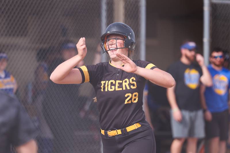Joliet West’s Brooke Schwall celebrates as she heads home after a grand slam against Joliet Central on Monday, May 15, 2023 in Joliet.