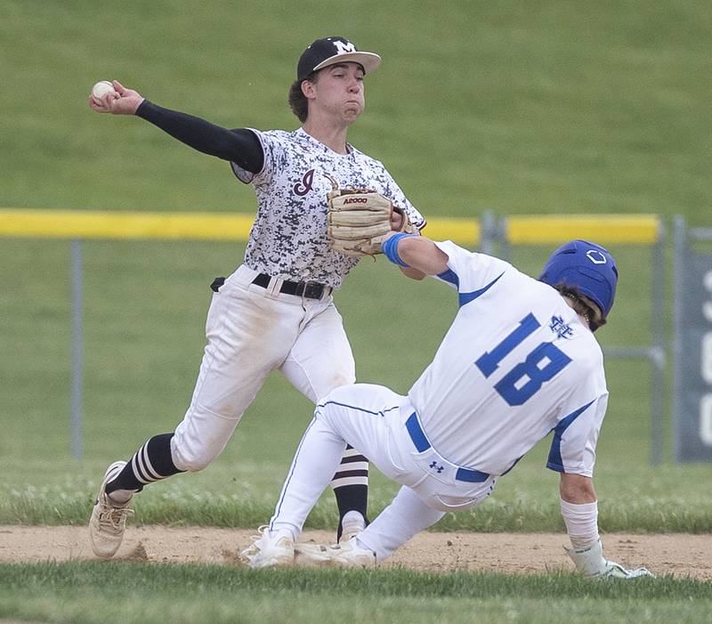 Marengo’s Robert Heuser has a double play broken up by Newman’s Garet Wolfe Wednesday, May 28, 2025, in the Class 2A Sectional semifinal in Mendota.