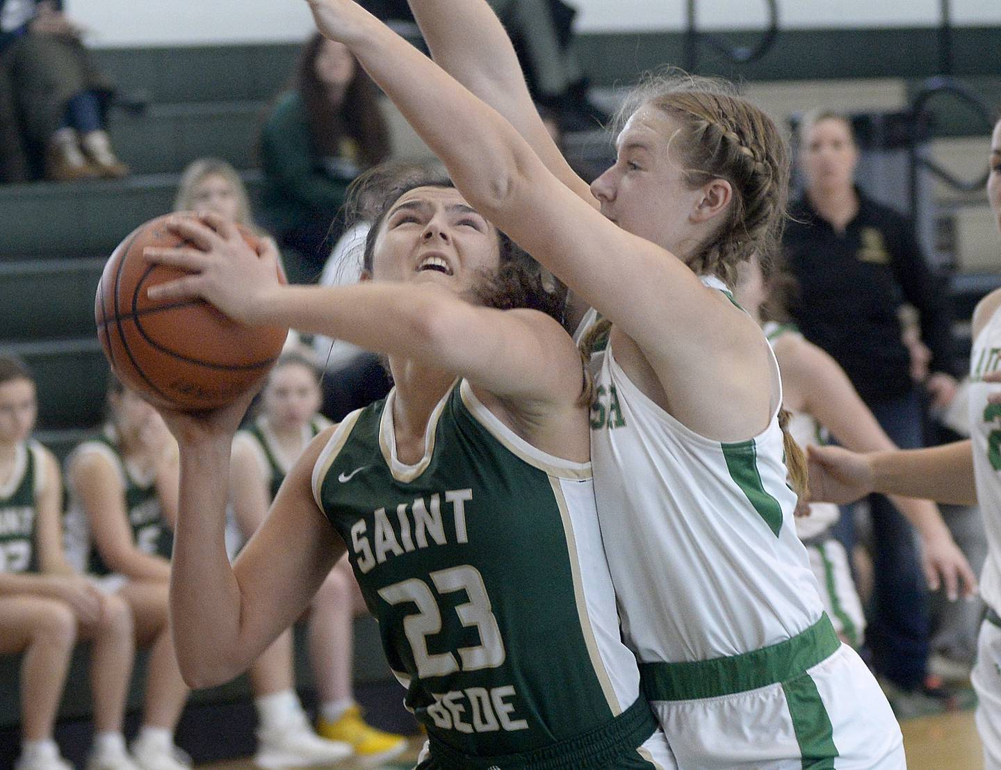 St Bede’s Ali Bosnich shoots against Seneca’s Ella Sterling Tuesday at St Bede.