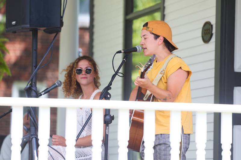 i.am.james, left, along with Lebo performs on a porch along Western Avenue. The Upper Bluff Historic District hosted Porch & Park Music Fest featuring a variety of musical artist at five different locations. Saturday, July 30, 2022 in Joliet.
