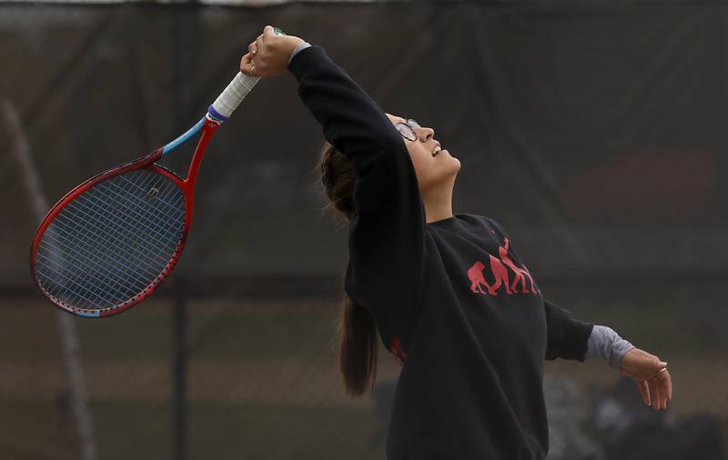 Ottawa’s Isabel Heimsoth serves the ball Thursday, Oct. 20, 2022, during during the first day of the IHSA State Girls Tennis Tournament at Schaumburg High School in Schaumburg.