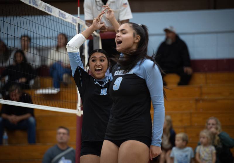 Kankakee's Elizabeth Avalos, back, and Karmen Rodgers, front, react to a point won over Bloom in a match on Tuesday, October 14, 2025.
