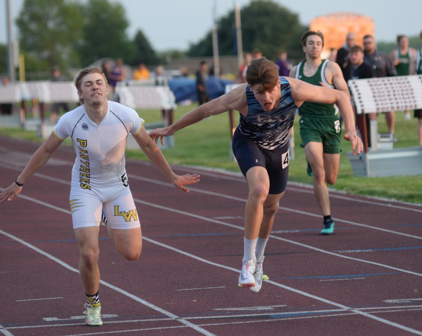 Bureau Valley's Elijah House leans into the finish line in the 400 meters at the1A Rockridge Sectional on Friday, May 19.