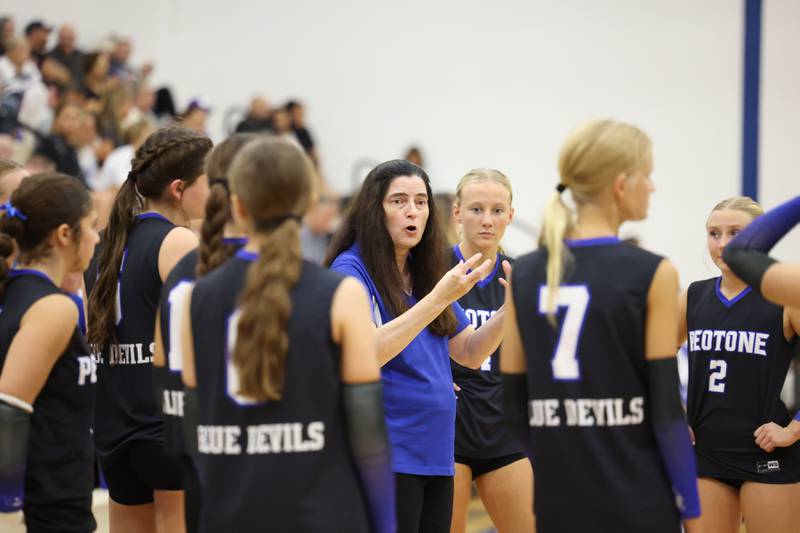 Peotone head coach Kathy Barger coaches her team in a timeout during the Blue Devils' loss in three sets, 19-25, 25-19, 25-21, to Manteno on Tuesday, Sept. 23, 2025.