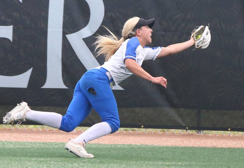 St. Charles North's Leigh VandeHei (3) makes a catch on the run in the Class 4A softball state championship on Saturday, June 11, 2022 at the Louisville Slugger Complex in Peoria.