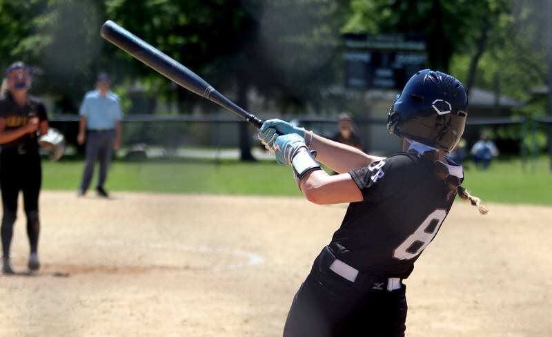 Prairie Ridge’s Ady Kiddy makes contact against Harvard during Class 3A softball regional final action at Lions Park in Harvard Saturday.