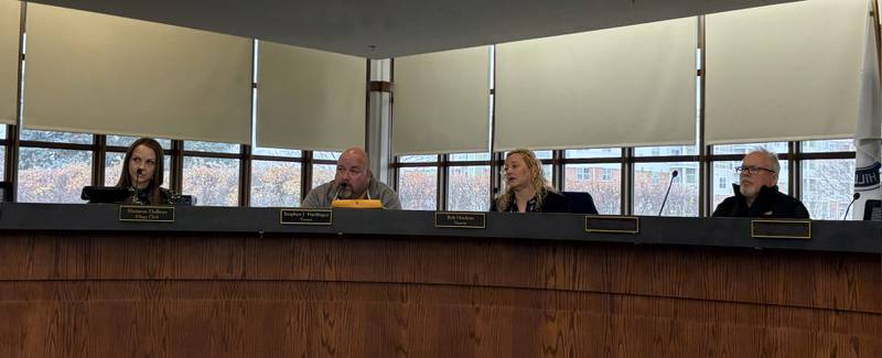 The Lake in the Hills electoral board listens during a hearing Nov. 29, 2024.