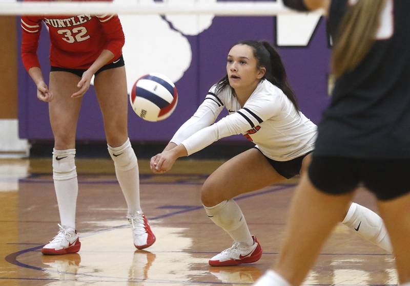 Huntley's Sophia Tocmo passes the ball forward during an IHSA Class 4A Hampshire Sectional semifinal volleyball match against Libertyville on Tuesday, Nov. 4, 2025, at Hampshire High School.