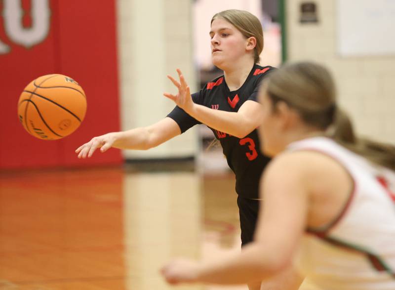 Hall's Leah Pelka passes the ball around L-P's Emma Jereb on Monday, Jan. 12, 2026 in Sellett Gymnasium at L-P High School.