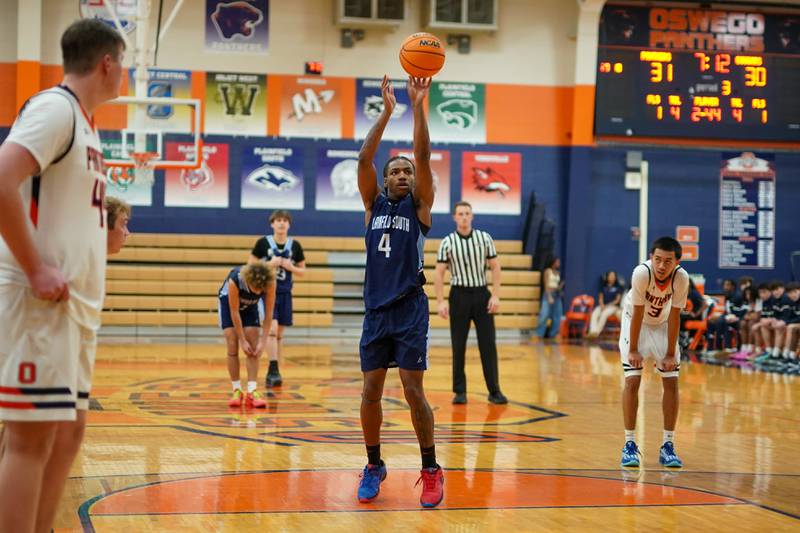 Plainfield South's Brilan Townsend (4) shoots a free throw during a basketball game against Oswego at Oswego High School on Friday, January 17, 2025.