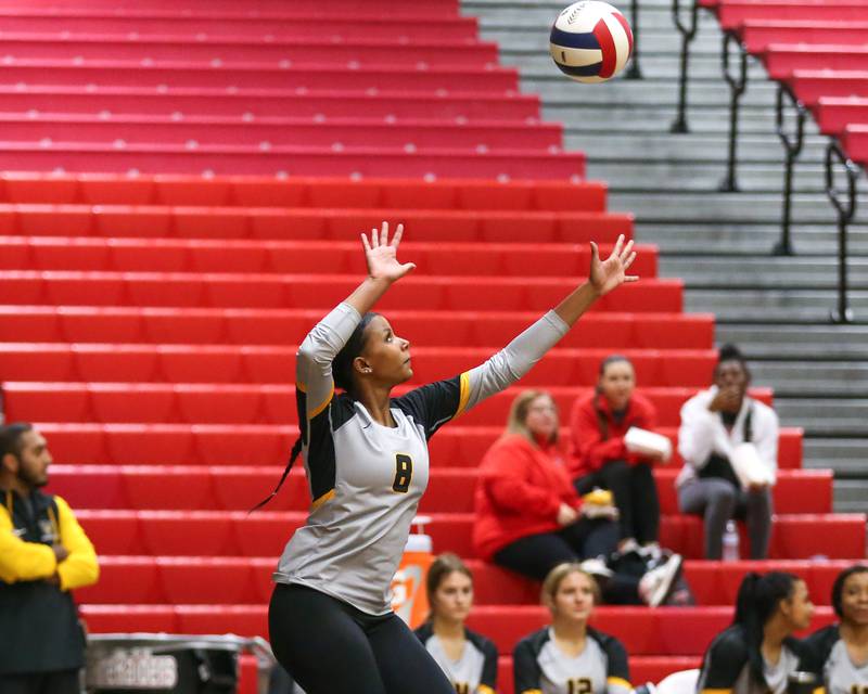 Joliet West's Eden Eyassu (8) serves during Class 4A Bolingbrook Sectional semifinal match between Joliet West at Oswego.  Nov 5, 2024  in Bolingbrook.