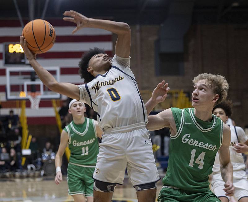Sterling’s Xavian Prather puts a shot up against Geneseo’s Jack Kreiss Friday, Dec. 5, 2025.
