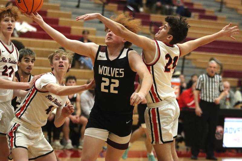Prairie Ridge’s Jonathan Kemp drives with the ball in varsity boys basketball on Tuesday, Feb. 18, 2025, at  Huntley High School in Huntley.