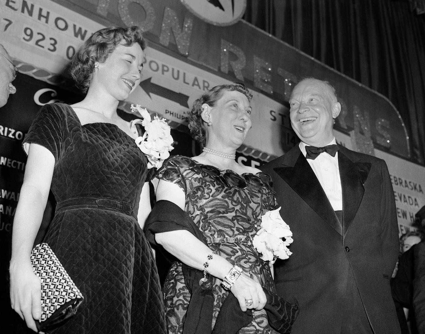 The next president and the next first lady of the United States, Dwight D. and Mamie Eisenhower, shown in New York City on Nov. 5, 1952, after victory in the election was assured. They are listening to the great ovation from the campaign workers crowding the Grand Ballroom of the Commodore Hotel where they appeared after Gov. Adlai Stevenson conceded defeat.