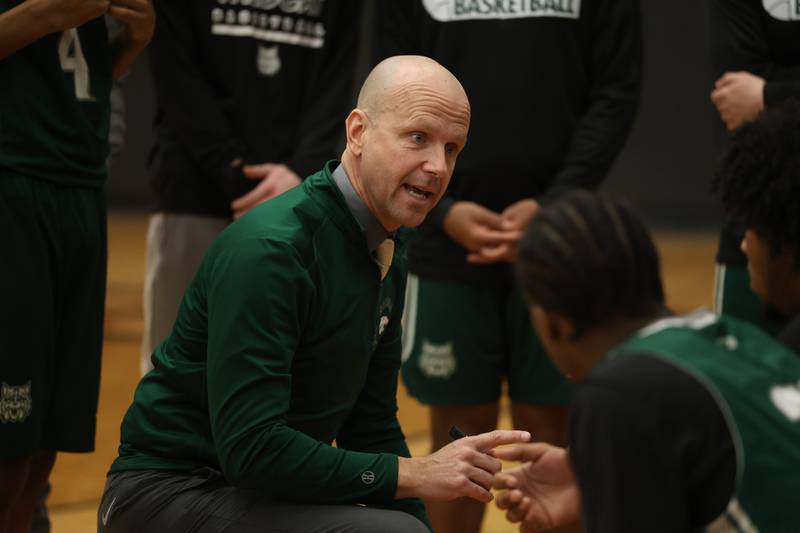 Plainfield Central head coach Tim Boe talks to the team between periods against Lincoln-Way West on Saturday, Jan 3, 2026 in New Lenox.