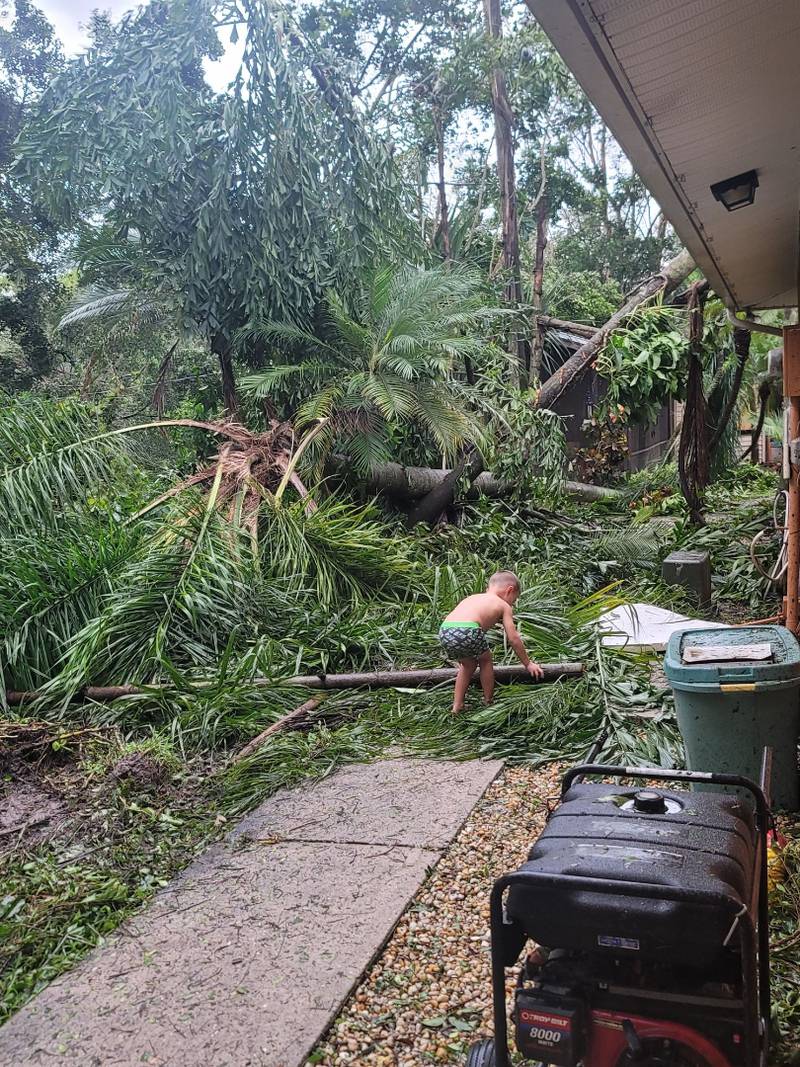 Slayden Bennett, 4, of North Fort Myers, Florida, surveys damage to his outdoor play area outside his home in the wake of Hurricane Ian in September 2022. Bennett's aunt, Nicole Adams of DeKalb, is planning to drive to Florida to help her family who's home has been dubbed a place of refuge for nearby neighbors. (Photo provided by Marcie Bennett)